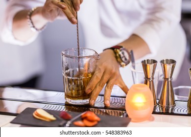 Bartender Mixer Pouring Cocktail Into Glasses Vodka