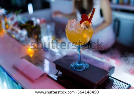 bartender mixer pouring cocktail into glasses Vodka