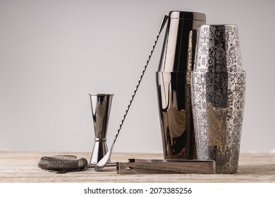 Bartender mixologist cocktail equipment shaker, jigger, bar spoon, strainer