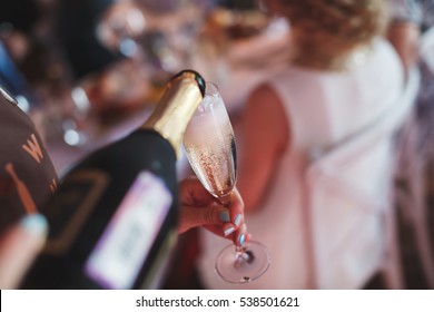 Bartender Pouring Champagne Into Glass, Close-up