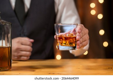 Bartender Pouring Whiskey, On  Bar,