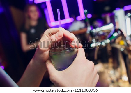 Bartender prepares cocktail