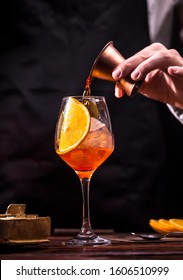 Bartender Is Preparing An Aperol Syringe