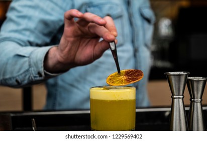 bartender preparing cocktail