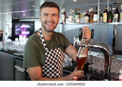 Bartender serving a refreshing looking beer