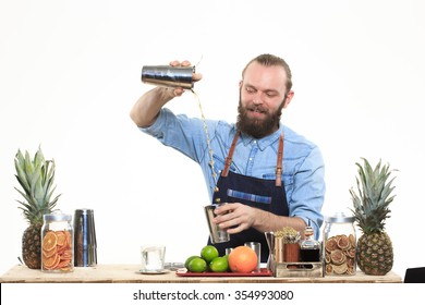 Bartender With A Shaker And Bottle On White Background. Behind The Bar