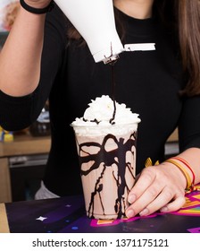 Bartender Woman Preparing Milkshake With Chocolate.