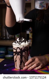 Bartender Woman Preparing Milkshake With Chocolate.