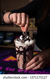 Bartender Woman Preparing Milkshake With Chocolate.