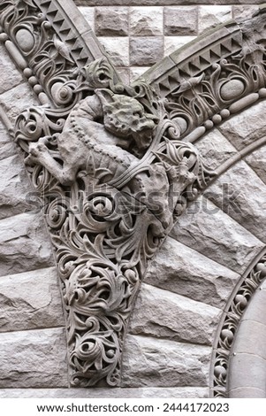 Bas relief stone decoration. Colonial architectural feature or detail in Old City Hall Building (1898), Toronto, Canada
