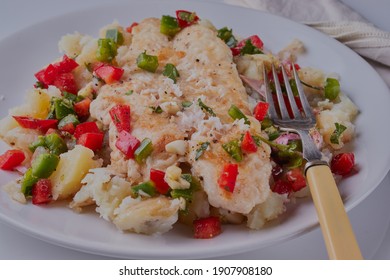 Basa Fillet With Crushed Garlic Potatoes.