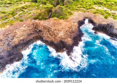 Basalt Columns In Bombo Quarry Coast Of Australia On Pacific Ocean - Aerial Top Down View.