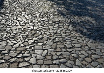 basalt hexagonal natural column created by the gradual solidification of lava, is used in the city as a safety dividing bollard on the corner of the lawn, sidewalk. pedestrian protection