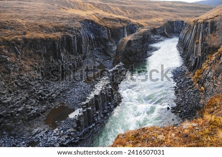 Similar – Image, Stock Photo Iceland | twisted basalt formations