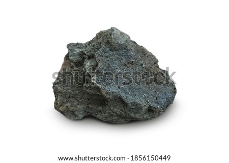 basalt rock stone isolated on a white background. Basalt is a mafic extrusive igneous rock.