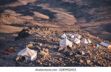 Base camp for tourists and climbers on the slopes of Mount Ararat, camp at sunset - Powered by Shutterstock