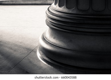 Base of a column in deep shadow