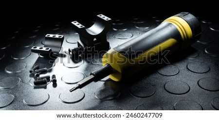 Base, ring and bolts to affix a scope to a rifle with the torque driver used to hand tool to torque things down properly.