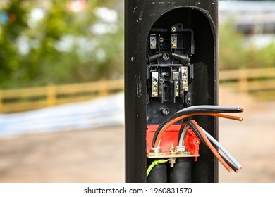 Base Of A Street Light With Cover Open Showing The Installation Of Wiring