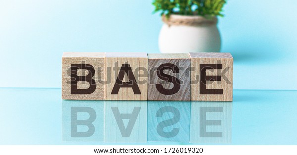 Base word from\
wooden blocks with letters, to divide or use something with others\
share concept, blue\
background