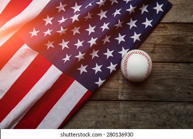 baseball with American flag in the background - Powered by Shutterstock