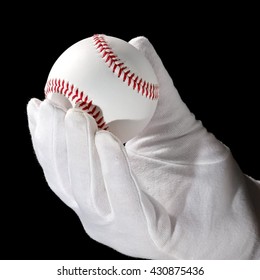 Baseball ball in a hand, close up