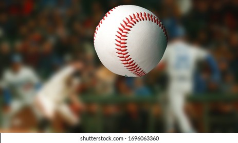 Baseball ball on blurred crowd background. Sport competitions.