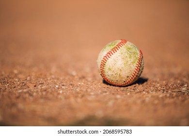 Baseball Ball On The Dirty Ground Background