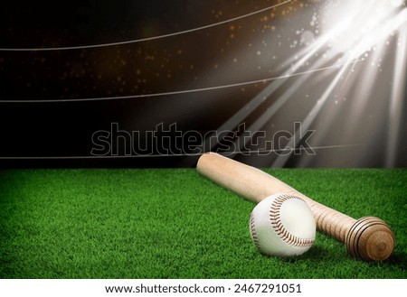 Baseball bat and ball on grass at stadium. Space for text