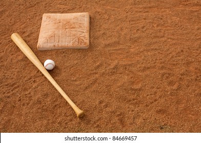 Baseball & Bat In The Infield Dirt With Room For Copy