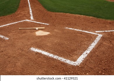 Baseball & Bat Near Home Plate