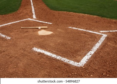 Baseball & Bat Near Home Plate