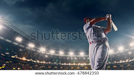 Baseball batter hitting ball during game on the professional stadium full of people. The stadium is made in 3D with animated crowd.