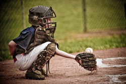 Baseball Catcher With Ball In Action