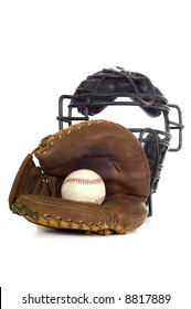 Baseball Catcher's Gear On White Background Including A Mitt, Ball And Face Mask