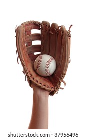 A Baseball Is Caught In A Worn Baseball Glove.