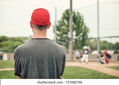 Baseball Coach Watching The Game