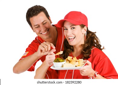 Baseball: Couple Having Fun Eating Nachos