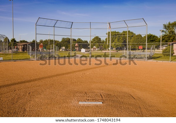 a baseball diamond where games should be\
played but now only has practices\

