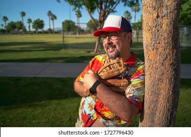 Baseball Fan Wearing Baseball Glove At A Baseball Park