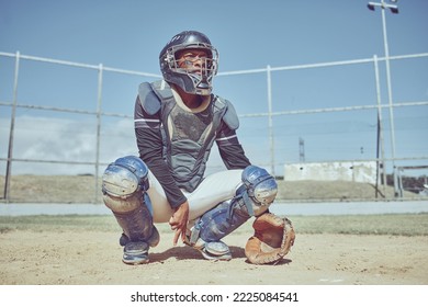 Baseball, Fitness And Catcher On A Baseball Field Training For A Sports Game In An Outdoor Exercise Workout In Summer. Focus, Wellness And Healthy Black Man In Safety Gear With A Secret Hand Gesture