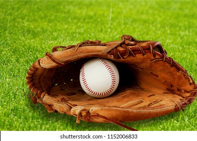 Baseball glove with a ball