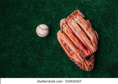 baseball glove, ball.