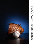 baseball glove and ball. Baseball equipment. Blue background