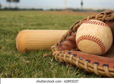 baseball glove and bat