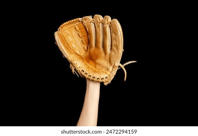 Baseball glove on woman's hand. Black background. Active sports, championship, victory, competition - Powered by Shutterstock