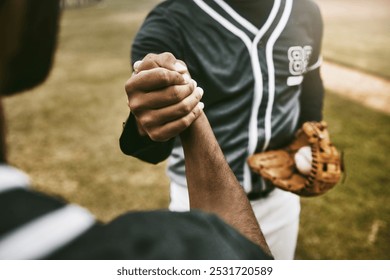 Baseball, handshake and men shaking hands to welcome, thank you or respect before a sports game or match start. Teamwork, collaboration and baseball players greeting in exercise or training outdoor - Powered by Shutterstock