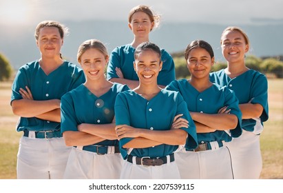 Baseball, happy and women team with arms crossed on a sport field after practice or a game. Teamwork, collaboration and support with a proud group of girl athletes ready to support, win and play - Powered by Shutterstock