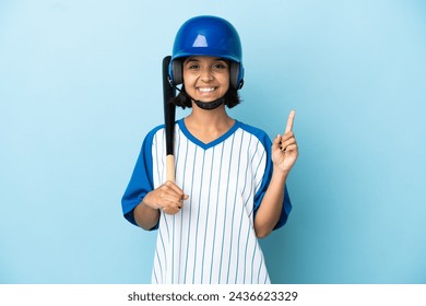 Baseball mixed race player woman with helmet and bat isolated on blue background pointing up a great idea - Powered by Shutterstock