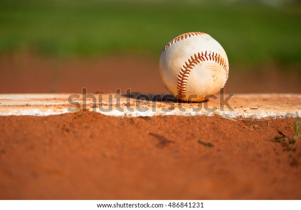 Baseball on pitcher\'s\
mound